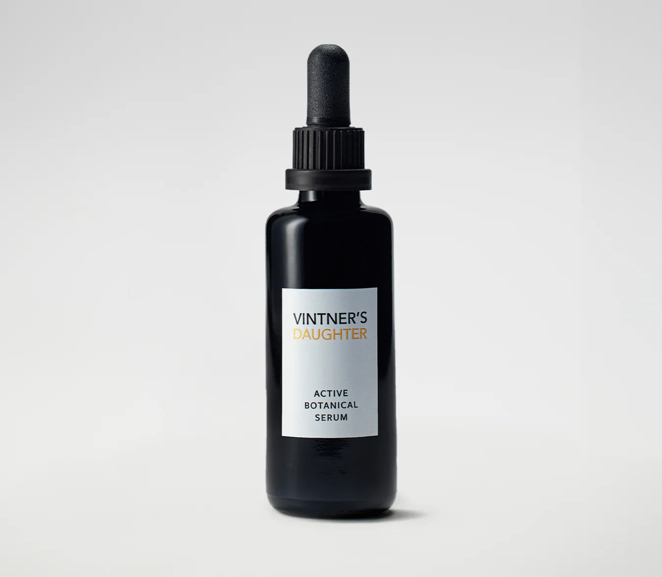 Black dropper bottle with white label reading Vinther&