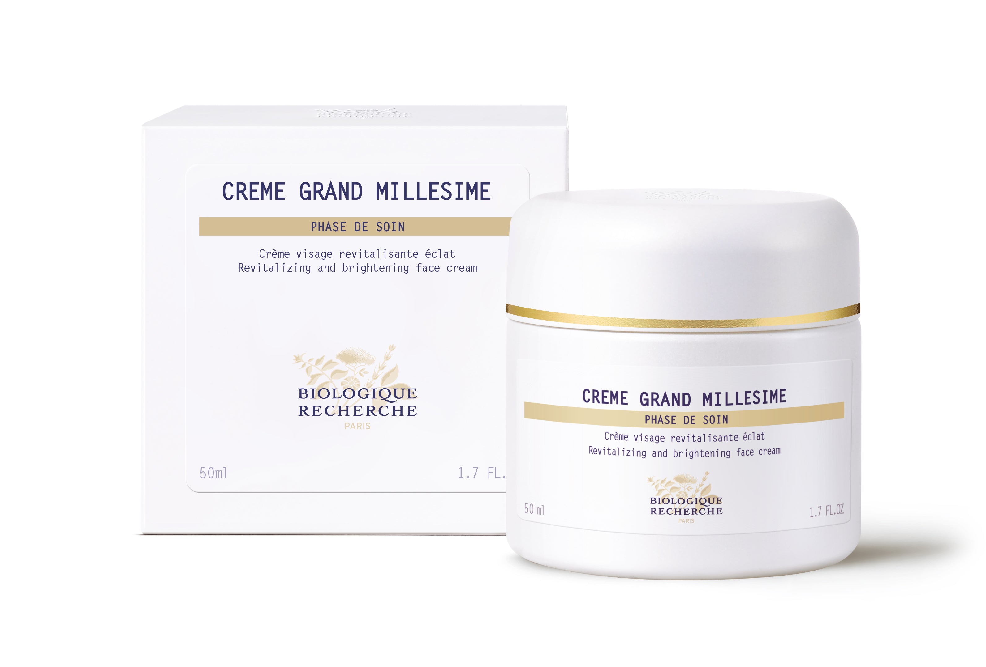 White jar of Crème Grand Millésime with gold accents beside matching white box with gold and navy text.