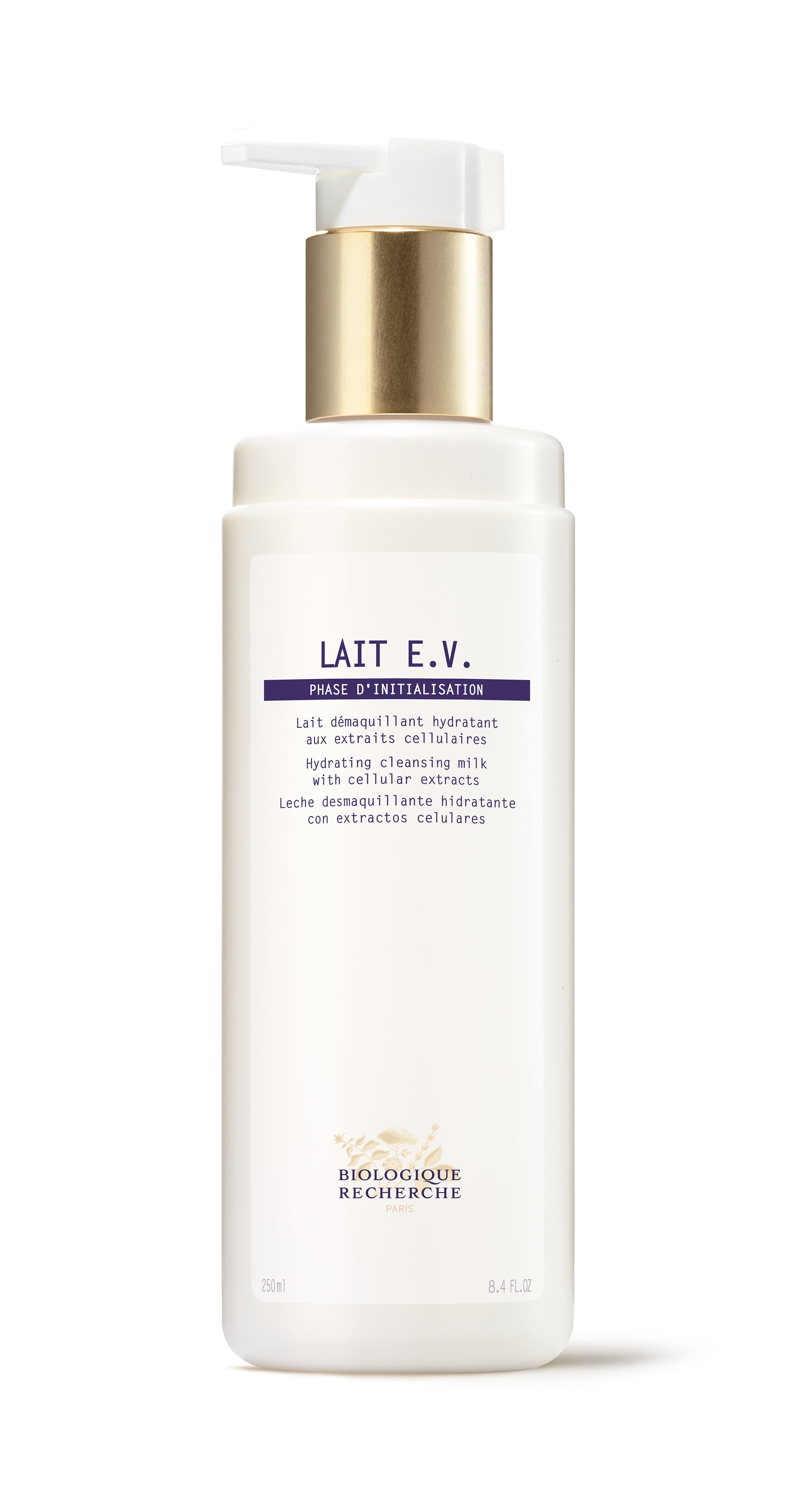 White plastic pump bottle with gold collar and purple text labeled Lait E.V. milk cleanser.