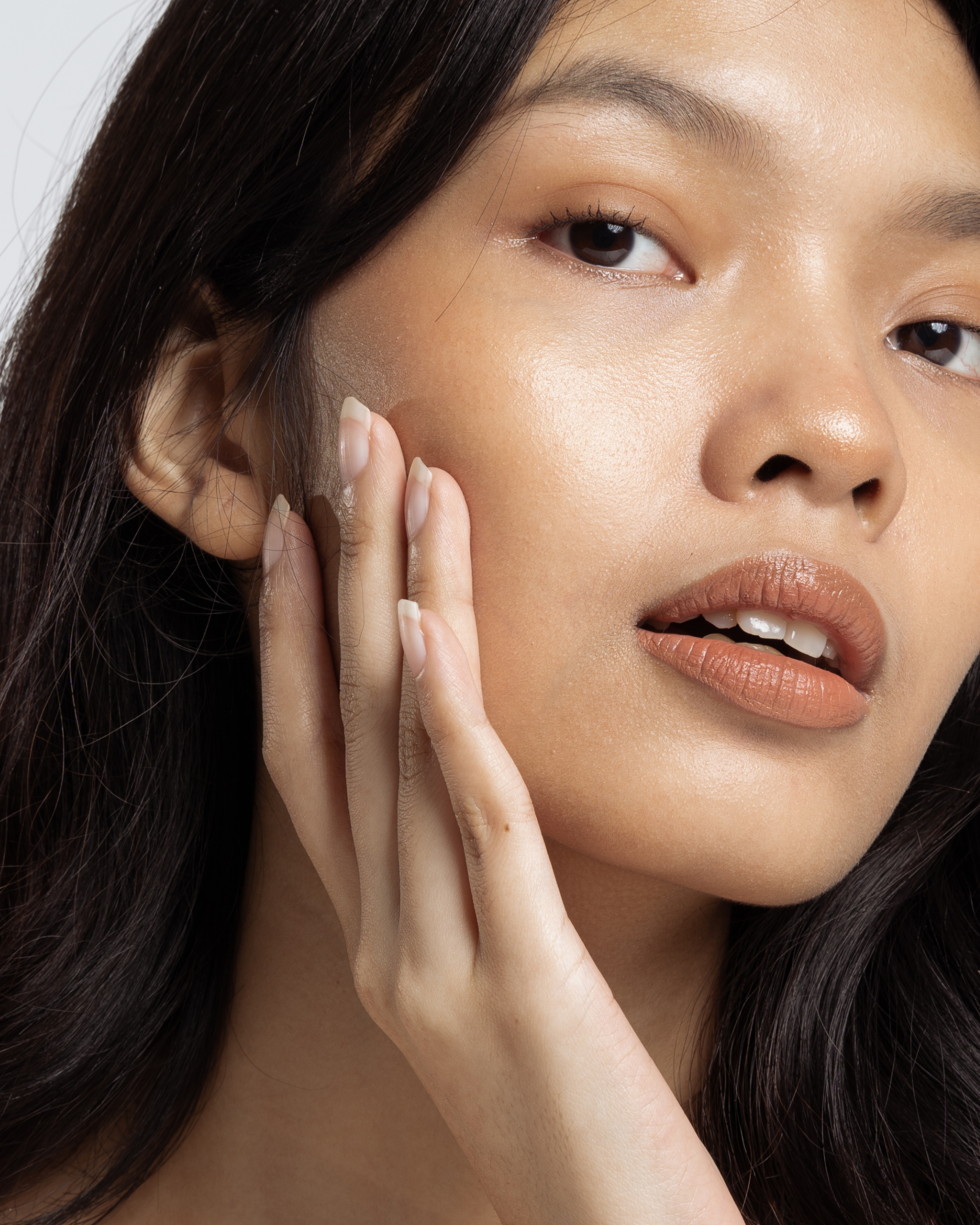 Close-up of dewy, deeply hydrated skin after a hydration peel at The Clinic Skin Health & Wellness Canberra